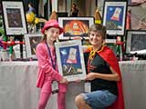 Denise purchased a Ninja Eraser painting in support of talented ten-year-old artist Caitlin McCollum. © Denise Gary