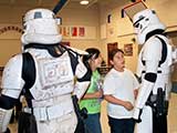It was obvious how excited the kids were to meet the Stormtroopers! © Denise Gary