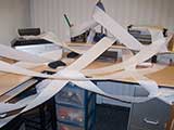 Her desk was cheerfully festooned with garlands of paper. © Denise Gary