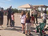 Kids gather for Ranger B's Desert CSI trail walk.