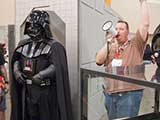 Darth and Wayne raffled <em>Star Wars</em> collectibles all weekend to benefit KNTR. © Carl Wagner
