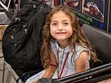 Savannah Riley joins her father in the KNTR booth. © Robert Gary