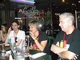 Robert, Denise, and Steve celebrate a successful Comicon experience with the volunteers. © Zach Snow