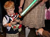 Little guy is going after Darth Vader! © Devon Christopher Adams