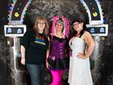 Debbie Brown, Denise Gary, and Lori Whipple thank everyone who attended the KNTR Geek Prom, and who worked to make it a success. © Eric Fiallos