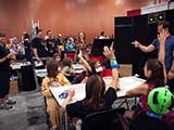 The first Build-a-Book program of the day starts out with a blank storyboard and audience participation. © Robert Gary