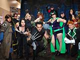 Costuming groups Justice League Arizona and Arizona Avengers conducted successful fundraisers for KNTR. The JLA played an Arkham Escape game in Exhibitor Hall and the AZA auctioned lunches with their members during the KNTR Geek Prom. © Bruce Matsunaga