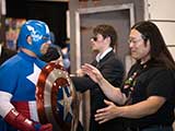 Bruce admires Captain America's shield. © Robert Gary