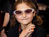 Savannah models the KNTR blinkie sunglasses. © Bruce Matsunaga