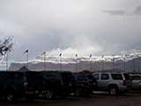 Fresh snow appears on top of the Superstition Mountains as the storm passes.