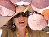 ASU Preparatory Academy Professor in Residence Josephine Marsh helped to hang pledge pumpkins, as they were coming in fast and furious! © Denise Gary