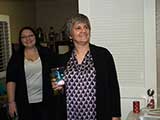 They are joined by Lori Cothrun of Bookmans, sponsors of the celebration. © Robert Gary