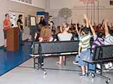 Shawn spoke to the children about what it meant to be a superhero and how they could apply the term to their own lives. © Denise Gary
