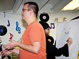 Tosh (and the other illustrators) drew sketch after sketch while Shawn talked to the kids. © Denise Gary