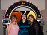 Lori Whipple presented the party on behalf of Bookmans.