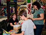 Nacole Vickery shares information about KNTR. © Denise Gary