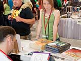 Yoda peers at the drawing activity from behind a passerby. © Bruce Matsunaga