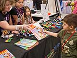 Here's how you hand out <em>Highlights</em>. © Robert Gary
