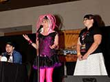 Denise Gary introduces Lori Whipple of Bookmans, sponsors of the KNTR Geek Prom. © Bruce Matsunaga