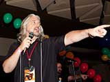 PJ brings on the live auction. © Bruce Matsunaga