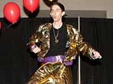 Although ineligible to win as KNTR staff, Robert Gary got into the spirit of the evening. © Bruce Matsunaga