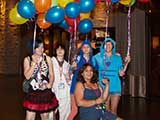 Happy prom-goers take home decorations. © Bruce Matsunaga