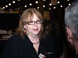 Debb is our beloved Booth Overlord! Love her Jayne Hat earrings. Oh, excuse me, “autumn hat with ear flaps.” © Robert Gary